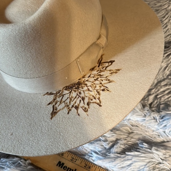 100 percent wool custom burned cowboy hat.